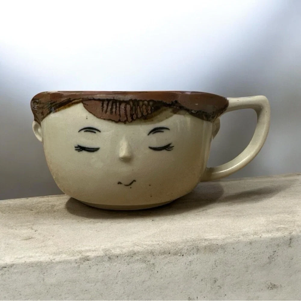 charming vintage stoneware anthropomorphic teacup